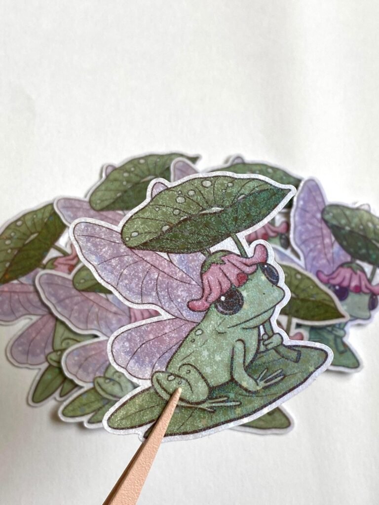 Sticker Holographique Grenouille Fée sur un Nénuphar