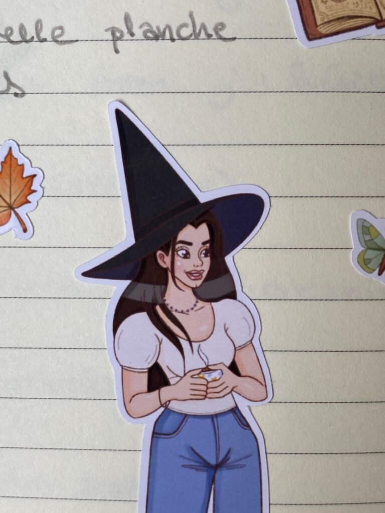 Stickers magiques Les Soeurcières posés sur un carnet de journaling